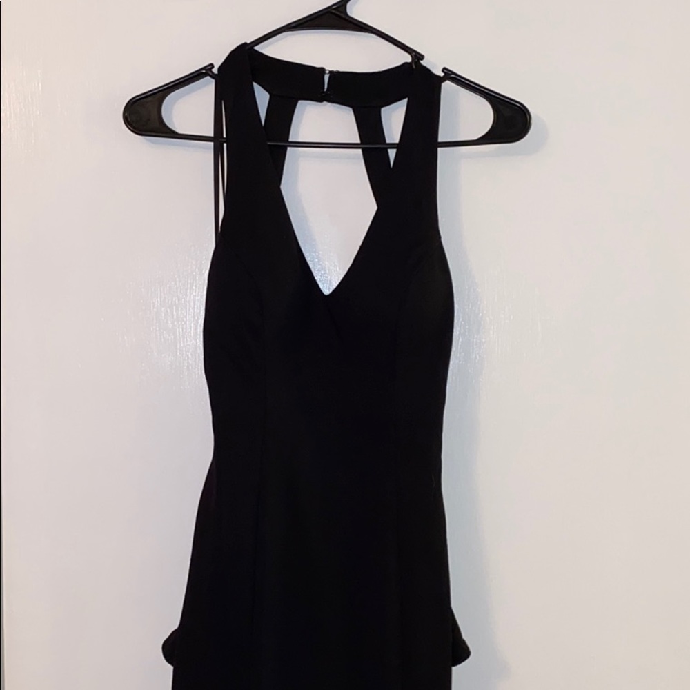 Black v-neck form fitting gown, peplum waist